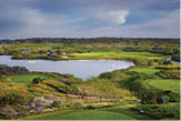 A beautiful golf course with a large body of water in the background. AI generated content