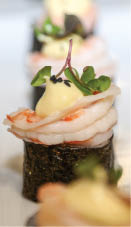 A plate of food with shrimp and sauce on a white plate. AI generated content