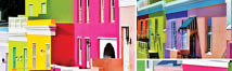 Colorful houses in a city, with a variety of colors and styles. AI generated content