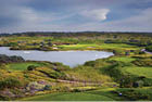 A golf course with a large body of water in the background. AI generated content